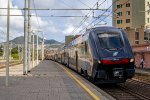 A Hitachi "Rock" EMU arrives at Sestri Levante from the south